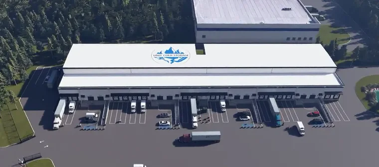 Aerial view of the Norton, Massachusetts facility: the full building, dock face and truck court.